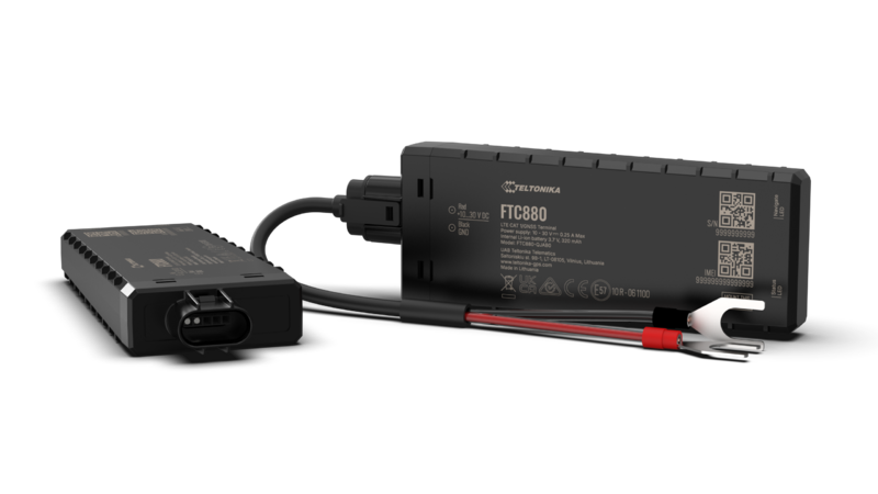 Black rectangular teltonika ftc880 4g lte cat 1 vehicle gps tracker with certification marks on the back side