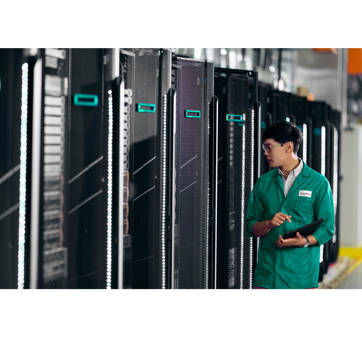 Aruba S1F79A AP-ANT-311 antenna in black server rack with teal labels, LED strips