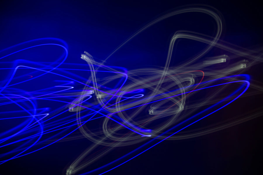 Abstract blue white light trails on dark background for IP Cambium wireless solutions