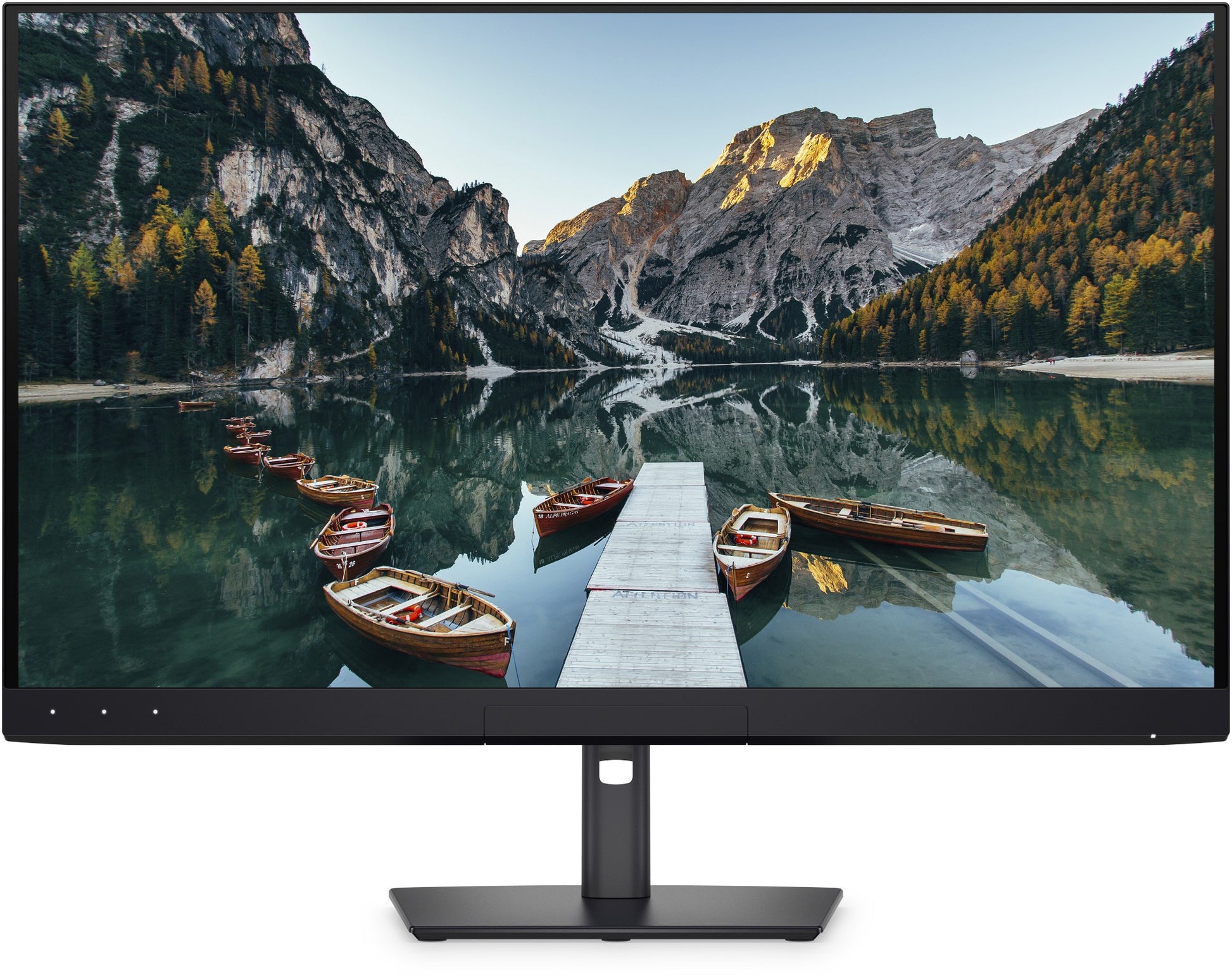 Black-framed Dell U3226Q UltraSharp 32 4K QD-OLED monitor displaying a serene mountain lake scene with wooden boats