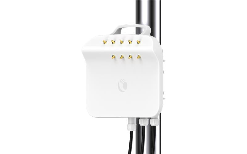 White rectangular cambium networks ePMP 4500C 5 GHz wireless access point with gold antenna connectors mounted on a pole