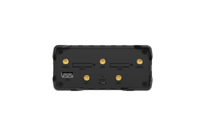 Black rugged teltonika rut986 industrial lte cat 4 router backside with gold antenna connectors and labeled sim usb wifi ports