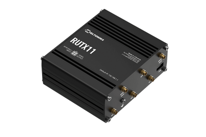 Black Teltonika RUTX11 LTE Cat 6 router with gold antenna connectors
