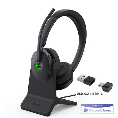 Yealink BH74 wireless headset with green light on charging stand