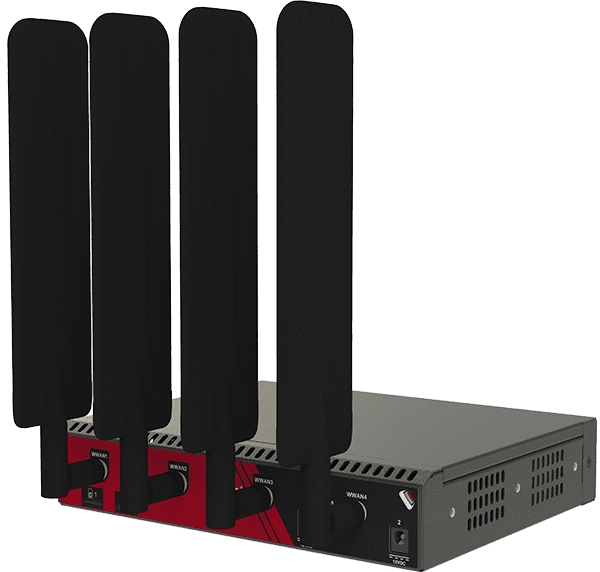 Red and black openggear cm8004-c wireless router with four tall antennas for 5g modem and console management
