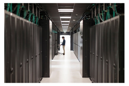 Technician in server room with Aruba S1F83A AP-ANT-345 antenna setup