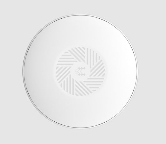 White circular wireless charging pad with metallic rim and geometric pattern for teltonika tap400 wifi 6 access point