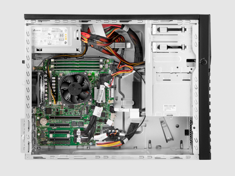 HPE ML30 Gen11 black silver tower with visible green motherboard, fan, RAM, cables