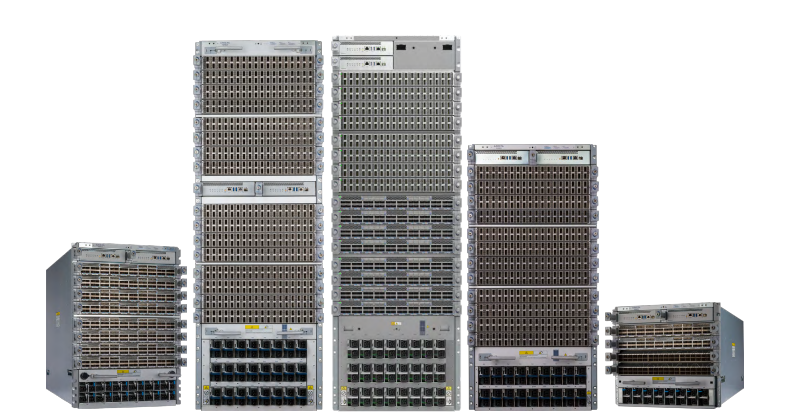 Silver-colored rack-mounted arista dcs-7804r4-bnda-u-dc network switches with port grid and ventilation slots