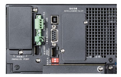 Back side of black Eaton 9SX15KPMAU UPS showing green terminal block and multiple usb serial and parallel ports