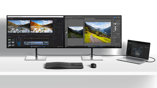 Hp b7jm6aa series 7 pro 732xk dual 31.5in 4k ultrawide monitors with slim black bezels and minimalist silver stands displaying video editing software