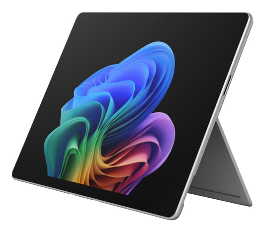 Silver microsoft surface pro 13 12th edition 2-in-1 tablet with oled screen and vibrant colorful abstract wallpaper
