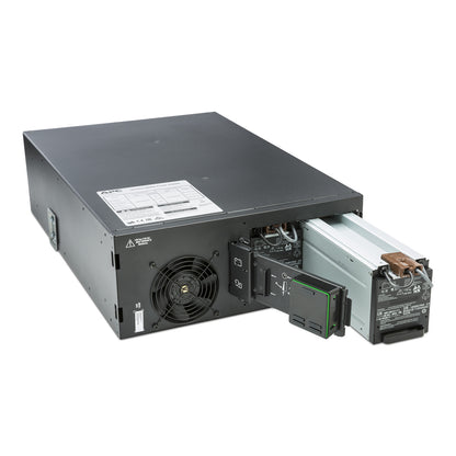 APC SRT6KRMXLI black metal server rack with pull-out battery and fan
