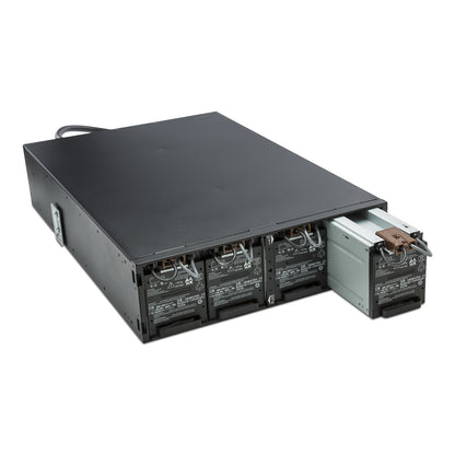 APC SRT192RMBP black metal rack with 4 battery units, one pulled out