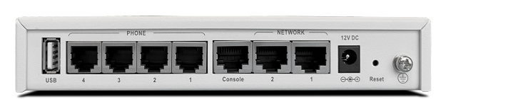 Fortinet FVG-GS04 white rectangular network switch with labeled USB, phone, ethernet ports