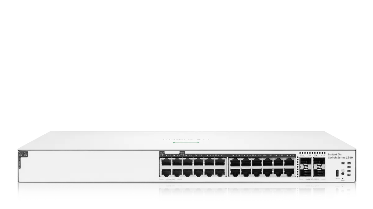 White hp instant on switch series s940 showing multiple ethernet ports and indicator lights on the back side