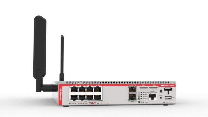 Allied telesis AT-AR4050S-5G-40 silver and red network switch with two black external antennas for 5G UTM firewall router