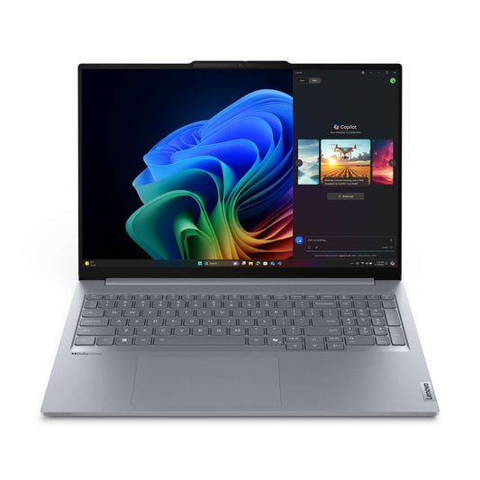 Silver Lenovo ThinkBook 16 Gen 7 laptop with vibrant abstract screen wallpaper