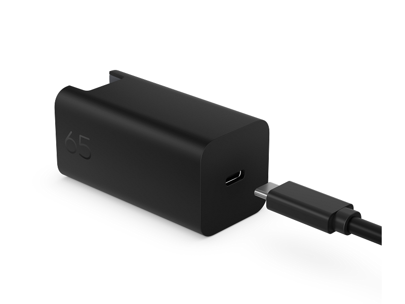 Black rectangular hp c90ckut 65w gan usb-c wall charger with matte finish and embossed 65 on the side