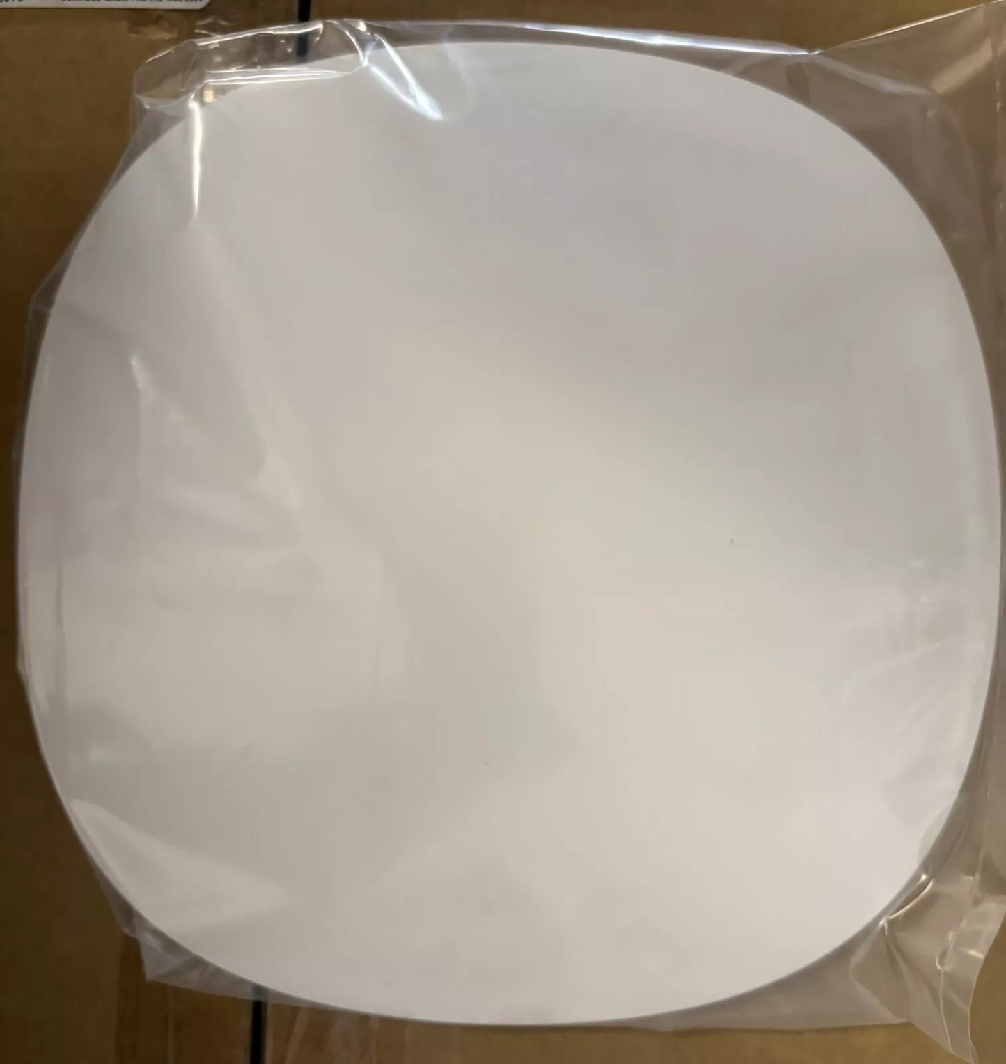 White non-glossy Aruba Q9H74A AP-515 snap-on covers, 20 pack, round flat plate wrapped in clear plastic