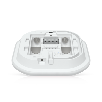 White plastic ceiling-mounted ubiquiti usl-siren wireless access point with integrated brackets and internal component slots